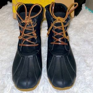 Black duck boots with brown laces